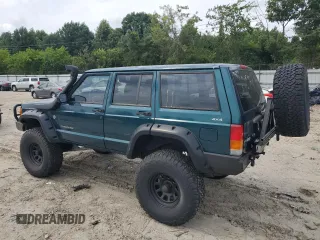 1997 Jeep Cherokee SE with VIN 1J4FJ28S2VL553709, listed as a Copart auction lot 63340974 with 154,029 mi miles and Clean Title. Bid and sale history available at carsss.com. Image 2.