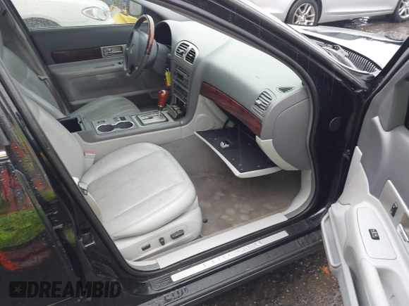 2005 Lincoln LS w/Luxury Pkg with VIN 1LNHM86S85Y618900, listed as a IAAI auction lot 41308598 with 203,974 mi miles. Bid and sale history available at carsss.com. Image 5.