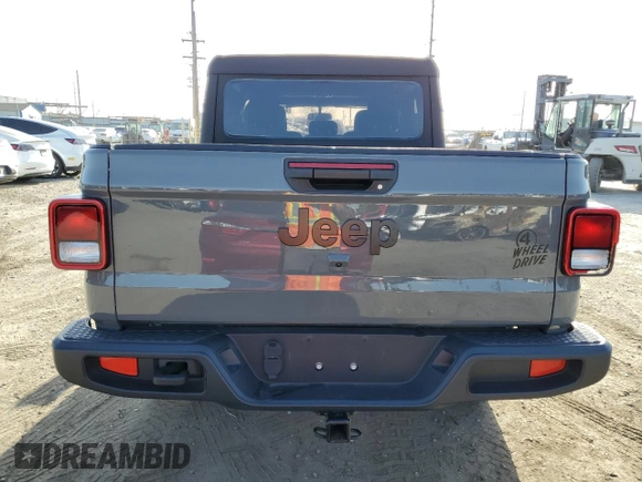 2023 Jeep Gladiator Willys z VIN 1C6HJTAG0PL561098, wystawiony jako Copart lot #51646485 z przebiegiem 20 554 mil mil oraz Szkoda całkowita • Salvage title. Historia ofert i sprzedaży dostępna na DreamBid. Obrazek 6.