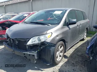 2018 Toyota Sienna L with VIN 5TDZZ3DC0JS965524, listed as a IAAI auction lot 41608423 with 63,815 mi miles and . Bid and sale history available at DreamBid. Image 2.