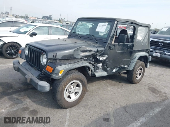 2002 Jeep Wrangler X with VIN 1J4FA39S92P774054, listed as a IAAI auction lot 41470351 with 209,727 mi miles. Bid and sale history available at carsss.com. Image 2.