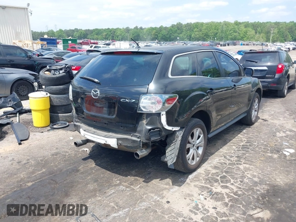 2010 Mazda CX-7 Touring z VIN JM3ER2W30A0341657, wystawiony jako IAAI lot #42123453 z przebiegiem 173 135 mil mil oraz . Historia ofert i sprzedaży dostępna na DreamBid. Obrazek 4.