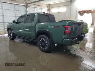 2024 Nissan Frontier SV z VIN 1N6ED1EK0RN603523, wystawiony jako Copart lot #57412365 z przebiegiem 33 638 mil mil oraz Szkoda całkowita • Salvage title. Historia ofert i sprzedaży dostępna na DreamBid. Obrazek 2.