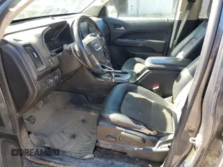 2016 GMC Canyon z VIN 1GTP6CE1XG1368688, wystawiony jako Copart lot #76475004 z przebiegiem 217 695 mil mil oraz Szkoda całkowita • Salvage title. Historia ofert i sprzedaży dostępna na DreamBid. Obrazek 7.