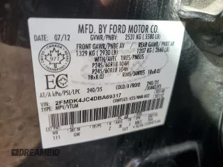 2013 Ford Edge SEL z VIN 2FMDK4JC4DBA69317, wystawiony jako Copart lot #77084544 z przebiegiem 108 808 mil mil oraz Szkoda całkowita • Salvage title. Historia ofert i sprzedaży dostępna na DreamBid. Obrazek 13.