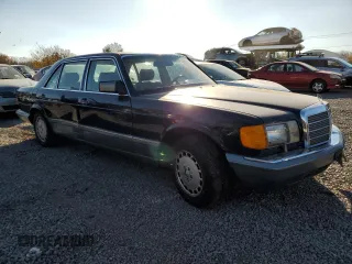 1986 Mercedes-Benz 560 with VIN WDBCA39DXGA233159, listed as a Copart auction lot 78498894 with 96,308 mi miles and Salvage Title. Bid and sale history available at DreamBid. Image 4.