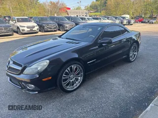 2009 Mercedes-Benz SL 550 z VIN WDBSK71F69F148290, wystawiony jako IAAI lot #42238570 z przebiegiem 161 833 mil mil oraz . Historia ofert i sprzedaży dostępna na DreamBid. Obrazek 2.
