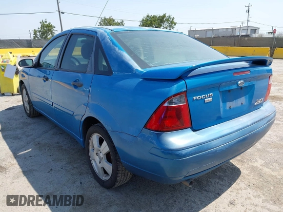 2007 Ford Focus S z VIN 1FAHP34N77W333895, wystawiony jako IAAI lot #42444411 z przebiegiem 155 522 mil mil oraz . Historia ofert i sprzedaży dostępna na DreamBid. Obrazek 3.