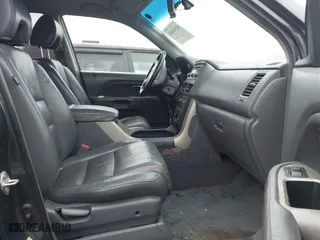 2006 Honda Pilot EX-L with RES with VIN 2HKYF18676H551683, listed as a IAAI auction lot 41501000 with 288,473 mi miles. Bid and sale history available at carsss.com. Image 5.