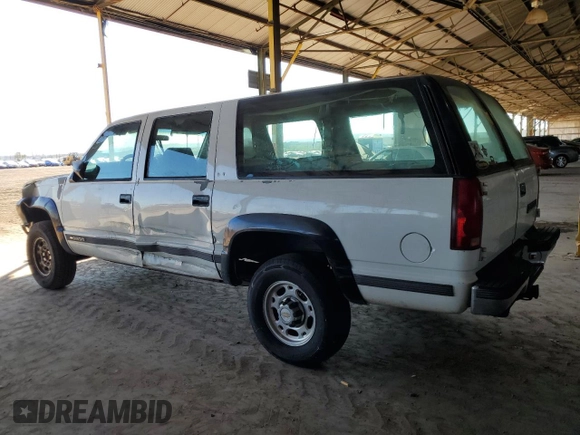 1993 Chevrolet Suburban z VIN 1GNGK26K8PJ352462, wystawiony jako Copart lot #76616364 z przebiegiem 147 505 mil mil oraz Czysty tytuł • Clean title. Historia ofert i sprzedaży dostępna na DreamBid. Obrazek 2.