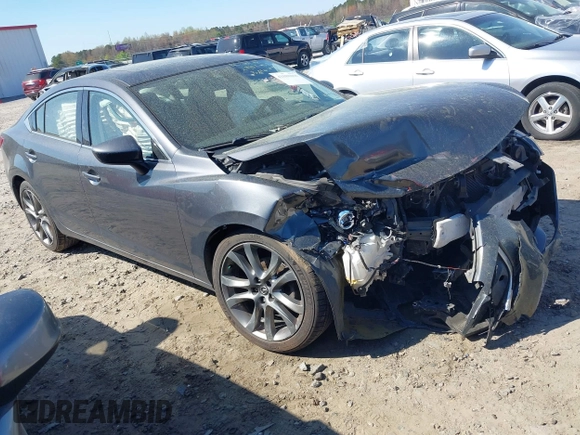 2016 Mazda Mazda6 i Grand Touring with VIN JM1GJ1W56G1432116, listed as a IAAI auction lot 41888066 with 124,182 mi miles. Bid and sale history available at carsss.com. Image 1.