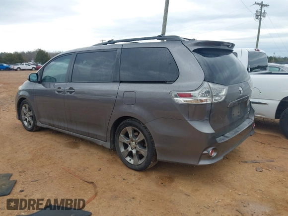 2011 Toyota Sienna SE with VIN 5TDXK3DC3BS143331, listed as a IAAI auction lot 41758043 with 215,490 mi miles. Bid and sale history available at carsss.com. Image 3.