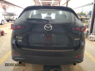 2023 Mazda CX-5 2.5 S with VIN JM3KFBAMXP0209820, listed as a Copart auction lot 43739645 with 9,653 mi miles and Salvage Title. Bid and sale history available at carsss.com. Image 6.