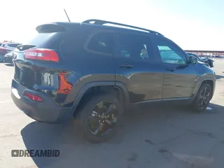 2016 Jeep Cherokee Altitude with VIN 1C4PJLAB2GW329397, listed as a IAAI auction lot 42294033 with 96,812 mi miles and . Bid and sale history available at DreamBid. Image 4.
