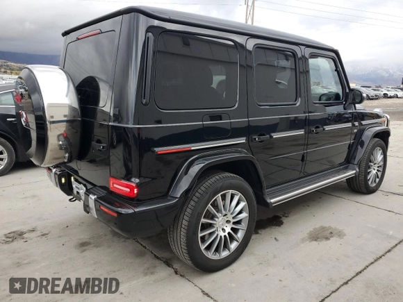 2023 Mercedes-Benz G 550 with VIN W1NYC6BJ0PX476536, listed as a Copart auction lot 79498634 with 17,674 mi miles and Salvage Title. Bid and sale history available at DreamBid. Image 3.