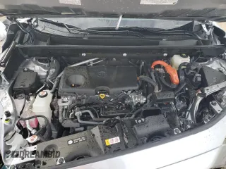 2023 Toyota RAV4 Hybrid XLE Premium z VIN JTMB6RFV8PD115723, wystawiony jako Copart lot #88005175 z przebiegiem 18 363 mil mil oraz Szkoda całkowita • Salvage title. Historia ofert i sprzedaży dostępna na DreamBid. Obrazek 12.
