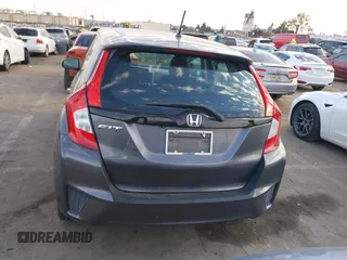 2015 Honda Fit LX with VIN 3HGGK5H5XFM719477, listed as a IAAI auction lot 41671194 with 145,876 mi miles. Bid and sale history available at carsss.com. Image 16.
