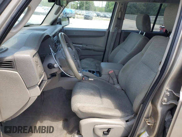 2006 Jeep Commander with VIN 1J8HG48N06C274675, listed as a Copart auction lot 54521835 with 134,587 mi miles and Salvage Title. Bid and sale history available at DreamBid. Image 7.