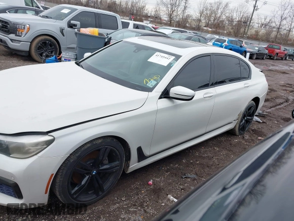 2016 BMW 7 Series 740i with VIN WBA7E2C50GG714647, listed as a IAAI auction lot 41745442 with 134,399 mi miles and . Bid and sale history available at carsss.com. Image 15.