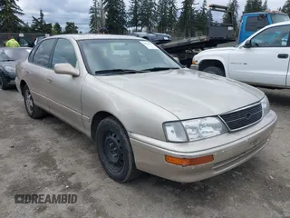 1997 Toyota Avalon XL with VIN 4T1BF12B0VU200142, listed as a IAAI auction lot 41633242 with 205,477 mi miles and . Bid and sale history available at DreamBid. Image 1.