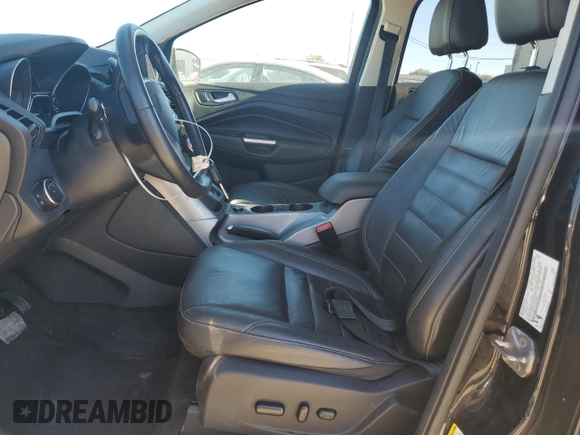2016 Ford Escape SE with VIN 1FMCU9GX1GUC24692, listed as a Copart auction lot 88102815 with 114,900 mi miles and Salvage Title. Bid and sale history available at DreamBid. Image 7.