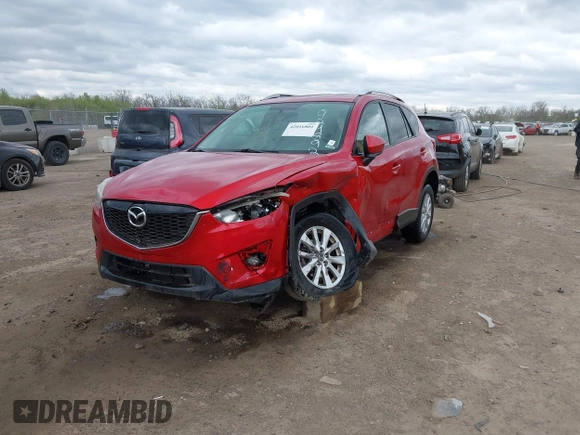 2014 Mazda CX-5 Touring z VIN JM3KE2CY3E0424892, wystawiony jako IAAI lot #42016801 z przebiegiem 173 350 mil mil oraz . Historia ofert i sprzedaży dostępna na DreamBid. Obrazek 12.