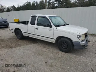 1999 Toyota Tacoma z VIN 4TAVL52N6XZ555376, wystawiony jako Copart lot #85763154 z przebiegiem 229 914 mil mil oraz Nie do naprawy • Non repairable. Historia ofert i sprzedaży dostępna na DreamBid. Obrazek 4.