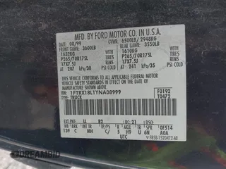 2000 Ford F-150 XL with VIN 1FTRX18L1YNA08999, listed as a IAAI auction lot 41988747 with 214,201 mi miles. Bid and sale history available at carsss.com. Image 9.