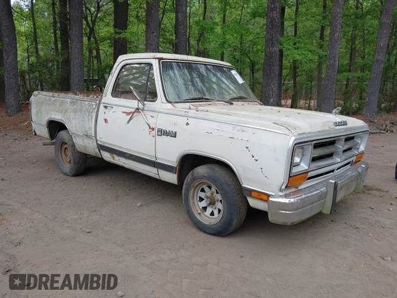 1986 Dodge Trucks z VIN 1B7HD14T7GS103836, wystawiony jako IAAI lot #42086259 z przebiegiem 83 201 mil mil oraz . Historia ofert i sprzedaży dostępna na DreamBid. Obrazek 1.
