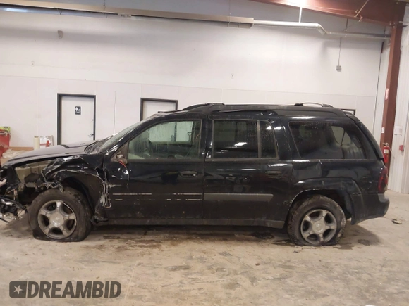 2004 Chevrolet TrailBlazer EXT LT with VIN 1GNET16SX46215438, listed as a IAAI auction lot 41481236 with 240,215 mi miles. Bid and sale history available at carsss.com. Image 14.