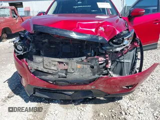 2016 Mazda CX-5 Grand Touring with VIN JM3KE2DYXG0652017, listed as a IAAI auction lot 42041158 with 95,946 mi miles and . Bid and sale history available at DreamBid. Image 6.
