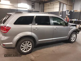 2017 Dodge Journey SXT z VIN 3C4PDCBG8HT589750, wystawiony jako IAAI lot #42286485 z przebiegiem 160 859 mil mil oraz . Historia ofert i sprzedaży dostępna na DreamBid. Obrazek 13.
