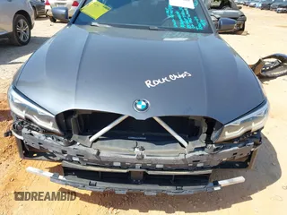 2019 BMW 3 Series 330i with VIN WBA5R1C5XKFH00567, listed as a IAAI auction lot 42076068 with 160,576 mi miles and . Bid and sale history available at DreamBid. Image 6.