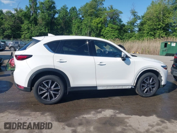 2018 Mazda CX-5 Grand Touring z VIN JM3KFBDM8J0420422, wystawiony jako IAAI lot #42188348 z przebiegiem 102 216 mil mil oraz . Historia ofert i sprzedaży dostępna na DreamBid. Obrazek 14.
