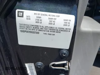 2005 Cadillac CTS with VIN 1G6DP567650227203, listed as a IAAI auction lot 42011203 with 151,683 mi miles. Bid and sale history available at carsss.com. Image 9.