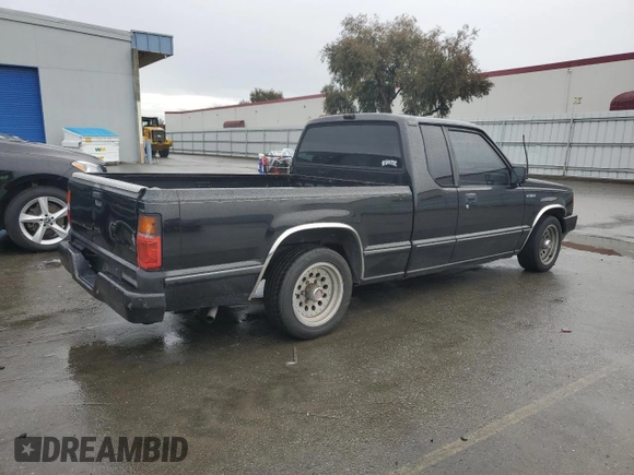 1991 Mitsubishi Mighty Max z VIN JA7FL25W7MP028365, wystawiony jako Copart lot #43964285 z przebiegiem 175 102 mil mil oraz Szkody całkowita. Historia ofert i sprzedaży dostępna na DreamBid. Obrazek 3.
