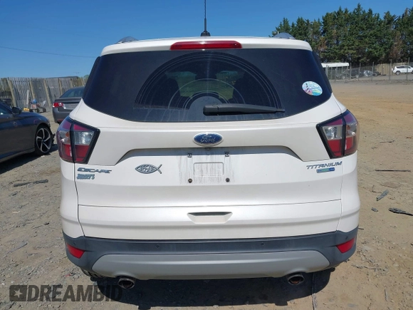 2017 Ford Escape Titanium with VIN 1FMCU9J96HUE21191, listed as a IAAI auction lot 42006013 with 71,786 mi miles. Bid and sale history available at carsss.com. Image 16.