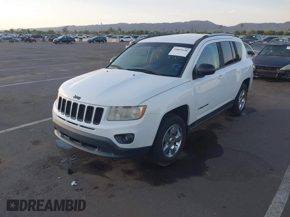2013 Jeep Compass Sport with VIN 1C4NJCBA1DD272937, listed as a IAAI auction lot 39855648 with 118,136 mi miles. Bid and sale history available at carsss.com. Image 2.