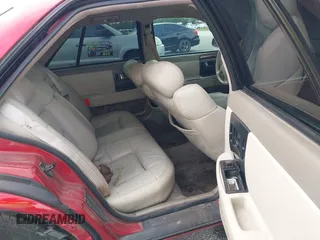 1995 Cadillac Seville Luxury SLS with VIN 1G6KS52Y7SU833943, listed as a IAAI auction lot 40873559 with 1 mi miles. Bid and sale history available at carsss.com. Image 8.