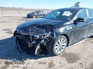 2018 Kia Optima S with VIN 5XXGT4L38JG268362, listed as a IAAI auction lot 41633956 with 79,347 mi miles and . Bid and sale history available at DreamBid. Image 6.