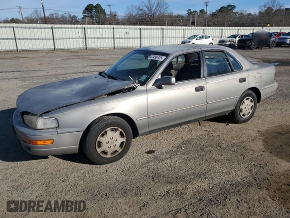 1992 Toyota Camry LE with VIN 4T1SK12E3NU104088, listed as a Copart auction lot 47496735 with 174,957 mi miles and Salvage Title. Bid and sale history available at carsss.com. Image 1.