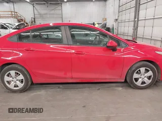 2018 Chevrolet Cruze LS with VIN 1G1BC5SM9J7216511, listed as a IAAI auction lot 41989915 with 67,740 mi miles and . Bid and sale history available at DreamBid. Image 14.