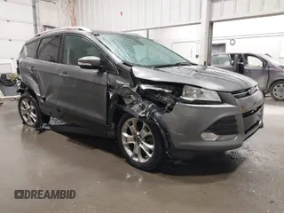 2014 Ford Escape Titanium with VIN 1FMCU9JX0EUB34228, listed as a IAAI auction lot 41713706 with 95,677 mi miles. Bid and sale history available at carsss.com. Image 1.