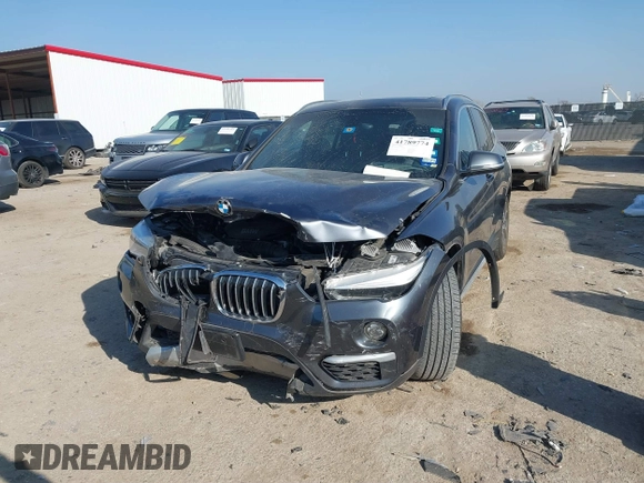 2016 BMW X1 xDrive28i with VIN WBXHT3Z35G4A49941, listed as a IAAI auction lot 41789774 with 111,661 mi miles and . Bid and sale history available at DreamBid. Image 17.