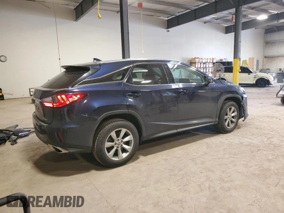 2018 Lexus RX 350 with VIN 2T2BZMCA8JC154579, listed as a Copart auction lot 54215705 with 73,700 mi miles and Salvage title. Bid and sale history available at DreamBid. Image 3.