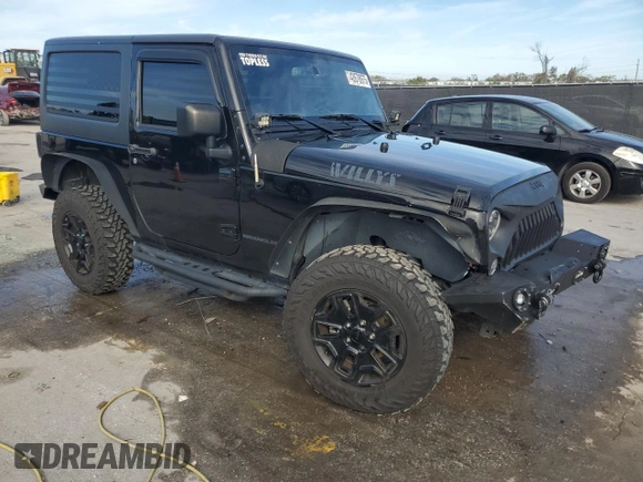 2017 Jeep Wrangler Willys Wheeler with VIN 1C4AJWAG1HL624254, listed as a Copart auction lot 42678975 with 51,936 mi miles and Salvage Title. Bid and sale history available at DreamBid. Image 4.