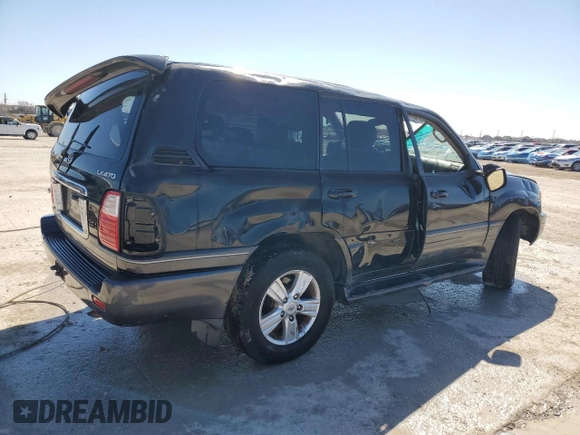 2004 Lexus LX 470 with VIN JTJHT00W043536558, listed as a Copart auction lot 48498305 with Not Provided miles and Salvage Title. Bid and sale history available at DreamBid. Image 3.