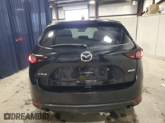 2018 Mazda CX-5 Touring with VIN JM3KFACM7J1452929, listed as a Copart auction lot 51945625 with 93,133 mi miles and Clean Title. Bid and sale history available at carsss.com. Image 6.