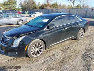 2013 Cadillac XTS with VIN 2G61N5S32D9238652, listed as a IAAI auction lot 40966692 with 90,834 mi miles. Bid and sale history available at carsss.com. Image 17.