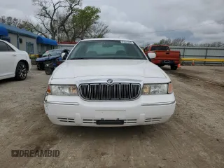 1999 Mercury Grand Marquis GS z VIN 2MEFM74W0XX670924, wystawiony jako Copart lot #51811055 z przebiegiem 176 559 mil mil oraz Szkoda całkowita • Salvage title. Historia ofert i sprzedaży dostępna na DreamBid. Obrazek 5.